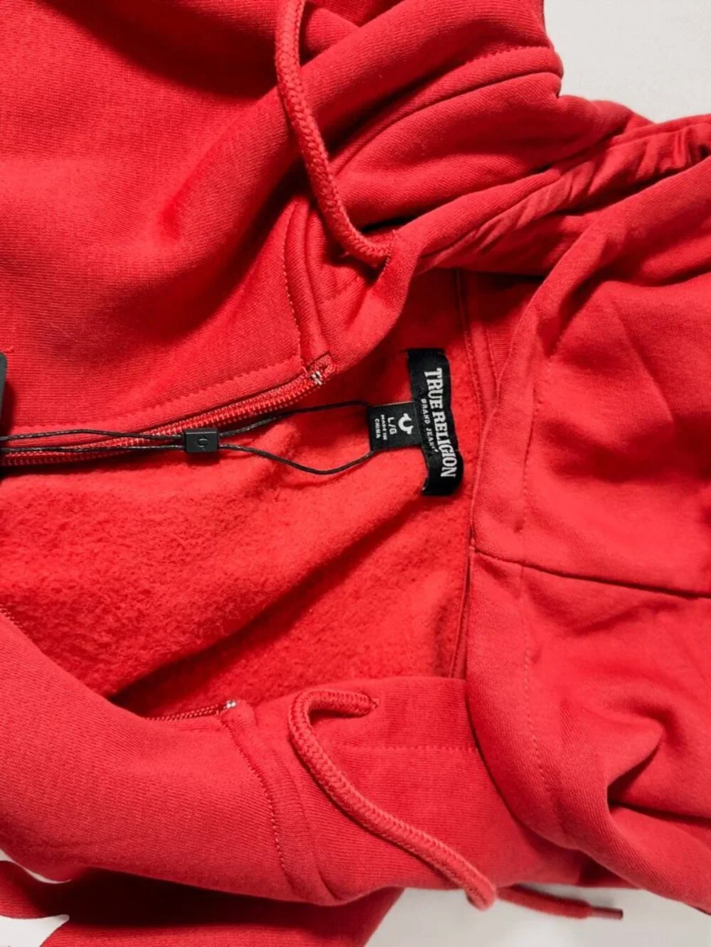 True religion hoody Size L men  with 2 pockets and front zipper  Red